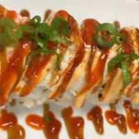 Dynamite Roll · Spicy tuna, cucumber, crab salad, spicy mayo, sushi sauce, sriracha sauce, shichimi togarashi