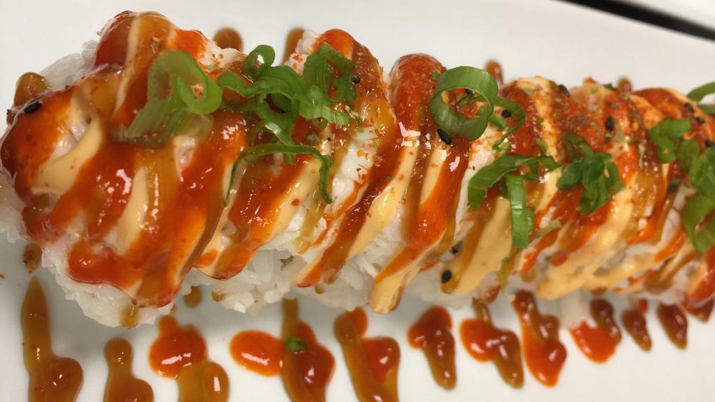 Dynamite Roll · Spicy tuna, cucumber, crab salad, spicy mayo, sushi sauce, sriracha sauce, shichimi togarashi