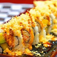 California  Crunch Roll · Avocado, cucumber, and crab salad, topped with spicy mayo, sushi sauce and tempura flake.