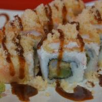 Crunch Lover Roll · In- tempura Shrimp, cucumber.
topped- crab salad, tempura crabstick, tempura flake, sushi sa...