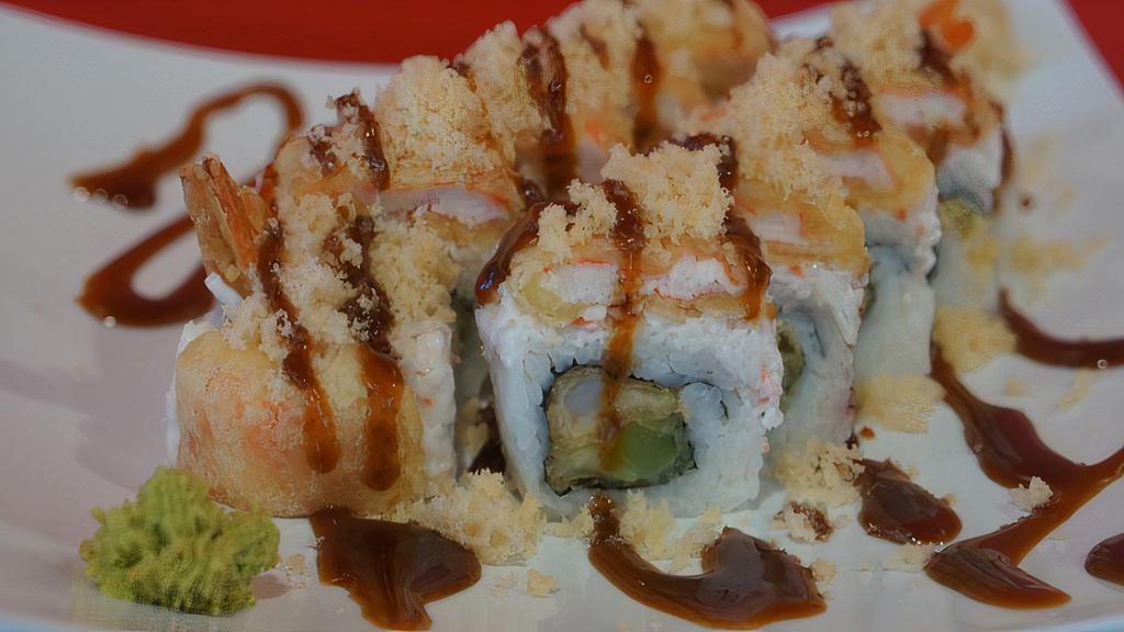 Crunch Lover Roll · In- tempura Shrimp, cucumber.
topped- crab salad, tempura crabstick, tempura flake, sushi sauce.