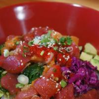House Spicy Poke Bowl · Spicy. Chopped spicy tuna over sushi rice, seaweed salad, red cabbage, avocado, cucumber, on...