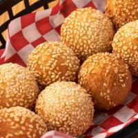 Sesame  Ball · Eight pieces, sweet red bean paste, rice flower, and sesame seeds. Deep fried.