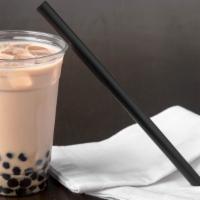House Special Bubble Tea · Non- Dairy Milk Tea.  Choose toppings :  Boba, Red bean, Strawberry Jelly, Mango Jelly, Coff...