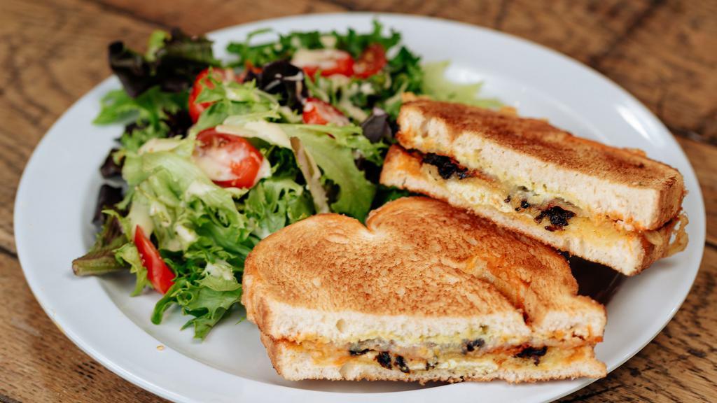 Jp Grilled Cheese · Melty white cheddar, poppin' cream cheese, garlic roasted jalapeños, french bread.