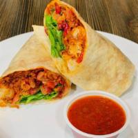 The Morrissey (Vegan) · Our delicious Vegan burrito is back! Loaded with tots, roasted red pepper & red onion mix, s...