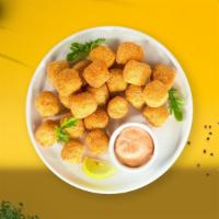 Tater Tots · (Vegetarian) Shredded Idaho potatoes formed into tots, battered, and fried until golden brow...