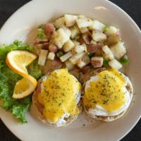 Florentine Eggs Benedict · Grilled English muffin topped with fresh spinach, sliced tomato, avocado, two poached eggs, ...