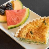 Broccoli Quiche · Broccoli, onion, and cheddar cheese, served with a side of fruit.