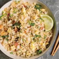 Thai Fried Rice · Spicy.  This traditional dish is for one one who loves spice and basil leaves. Stir-fried ri...