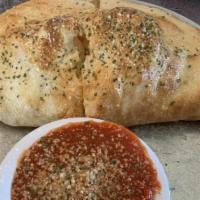 #11 Ham Or Pepperoni Calzone With Marinara And A Drink · 