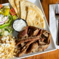 Gyro Meat Plate · Traditional flamed broiled lamb & beef mix. Served w/tzatziki & pita