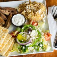 Roasted Lamb Plate · Roasted lamb rubbed w/fresh herbs & spices, then slow roasted. Served w/tzatziki & pita