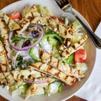 Greek Chicken Salad · Specially marinated & charbroiled chicken breast atop our large Greek salad served w/pita