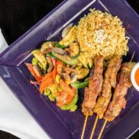 Saparta Souvlaki Pork Plate · Specially marinated skewers of Sparta pork. Served w/rice-pasta pilaf, harissa & pita