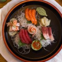 Sashimi Regular · 12 pieces assorted raw fish.