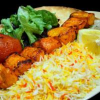 Tenderloin Chicken Kabob · Served with Saffron Rice, Tandoori Bread, Grilled Tomato and Salad