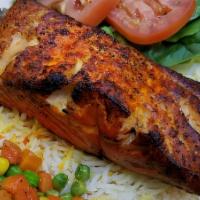 Grilled Salamon · Served with Saffron Rice, saute Veges and Salad