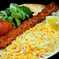 Chicken Kubideh Kabob · Served with Saffron Rice, Tandoori Bread, Grilled Tomato and Salad