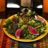 Teote Salad · Mixed greens, carrots and radishes tossed in a citrus dressing with roasted pumpkin seeds. A...