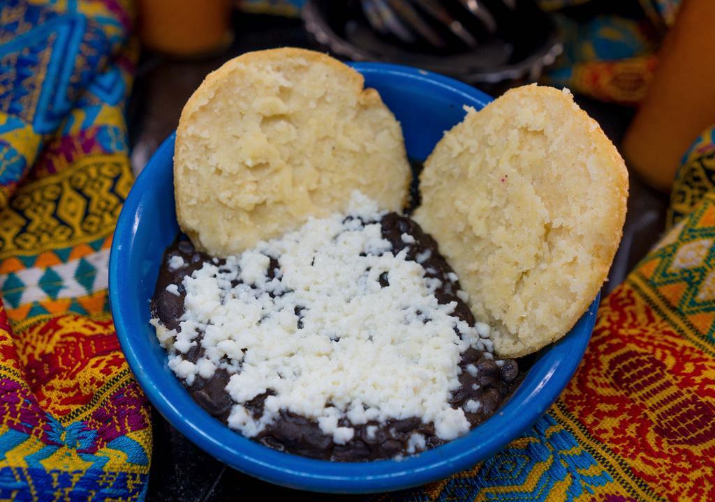 Ninos Domino Arepa · Arepa with black beans and queso fresco.
