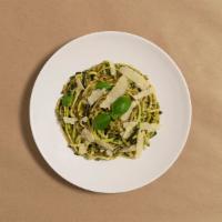 Pesto Parmesan Zoodles · Zucchini noodles with savory pesto and fresh Parmesan cheese.