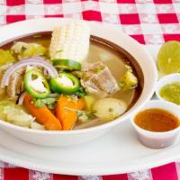 Caldo De Res (Beef Soup) · Beef soup prepared with potato, squash, carrot and corn. Includes side of rice and tortillas.