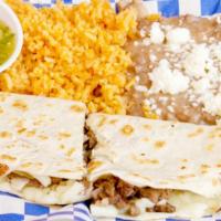 Quesadilla Asada (Beef) · Includes side of rice and beans.