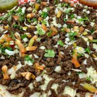 Steak Quesadilla Platter · A 14inch round quesadilla stuffed with 2lbs of Steak, loaded with mozzarella cheese, and top...