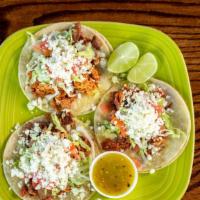 Taco Arriero · Three pieces. Signature cowboy tacos! It is a great mixture of chopped steak, chicken, ham, ...