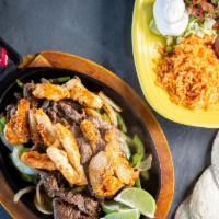Los 3 Garcia'S Fajitas · Choice of three fajitas served with a side of rice, beans, lettuce, cheese, guacamole, sour ...