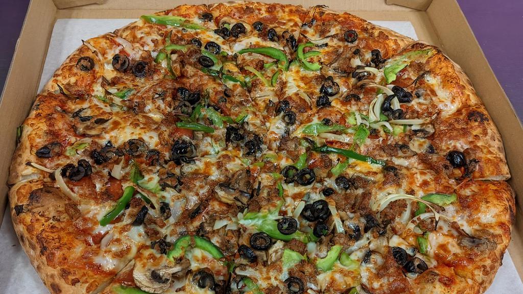 Mag-Nificent Giant · Marinara Sauce, Mozzarella Cheese, Pepperoni, Italian Sausage, Yellow Onion, Green Pepper, Black Olives, & Mushrooms.. Our Magnificent Take On The Supreme!