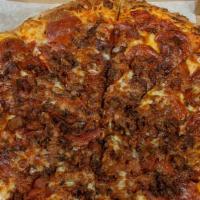 The Beast · Marinara Sauce, Mozzarella Cheese, Pepperoni, Salami, Italian Sausage, & Bacon.  . Our Magni...