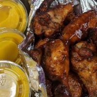 15 Oven Roasted Wings · 15 Wings, Voted Best in Tucson!  Served With 3 Dipping Sauces
