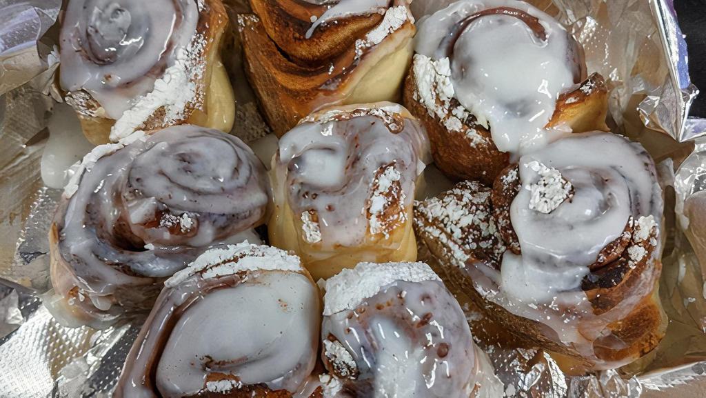 Cinnamon Swirls · Mini House-Made Cinnamon Rolls.  Topped With Powdered Sugar & Covered in Breakfast Icing!