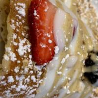 Pancake Roll · Fresh strawberries, blackberries, and bananas covered with low fat vanilla yogurt rolled ins...