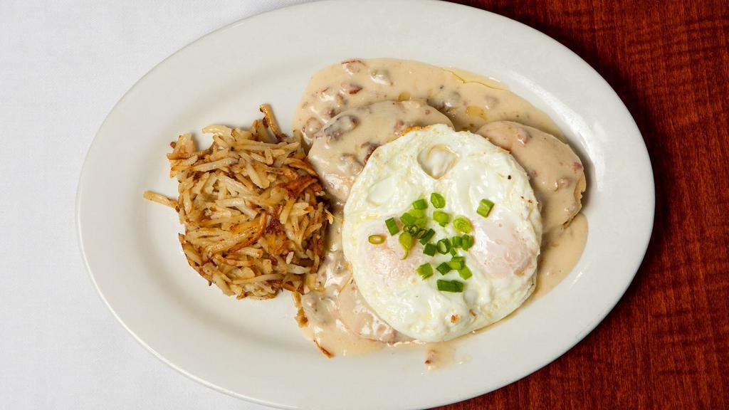 Biscuit & Gravy · Homemade buttermilk biscuits smothered in our savory country style gravy. served with 2 eggs and hash browns.