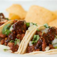 3 Soft Tacos W/Rice And Beans Plate · Choice of meat, rice, beans, lettuce, tomato, sour cream and chips