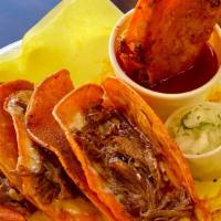 5 Queso Birria Tacos · Marinated beef and cheese grilled tacos. Served with birria broth, onions and cilantro on th...