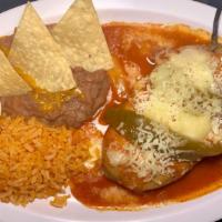 2 Chile Relleno Plate · 2 Chille Rellenos, rice and beans, lettuce, tomato, sour cream, chips. Chiles covered in sal...