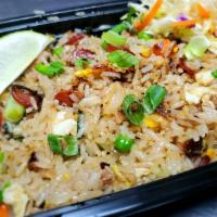 Garlic Fried Rice · Roasted garlic, egg, peas, carrot, onion, and Chinese sausage.