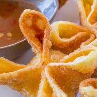 Crab Cheese Wonton (6Pc) · 6 pieces. Hand Made with cream cheese, imitation crab, green onion and black pepper.