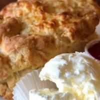 Buttery Buttermilk Biscuit · scratch baked and served with raspberry freezer jam and butter