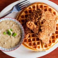 Chicken N' Waffles · Top menu item. Chicken tenders served with a side of sausage gravy or sriracha maple syrup.