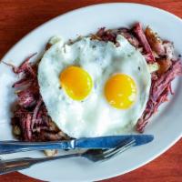 House Corned Beef Hash & Eggs · Top menu item. A mixture of our house corned beef, diced potatoes, peppers & onions topped w...