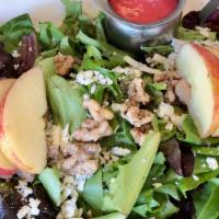 Green Lake Salad · Wild greens drizzled with raspberry vinaigrette dressing, candied walnuts, apple slices and ...