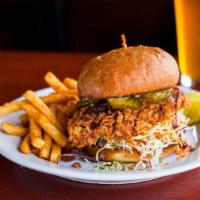 Nashville Crispy Chicken Sandwich · Crispy chicken breast ‘full of heat’, bread ‘n butter pickles, cabbage slaw, & mayo on a bri...