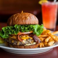 Basic Cheese Burger · Topped with cheddar, Monterey jack, pepper jack, American gorgonzola or swiss, lettuce, toma...