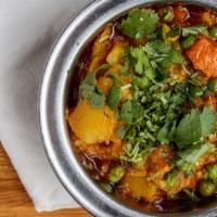 Vegetable Handi · A great choice of veggies cooked Punjabi style with cauliflower, carrots, potatoes and green...