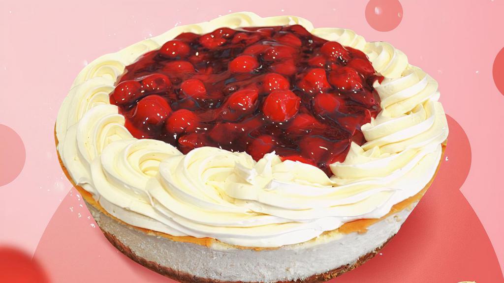 Cheesecake Cherry · Baked cheese cake with vanilla cookie base, decorated with Suspiros cream and cherry.
12 portions, Diameter: 22 cm.Height: 7 cm.